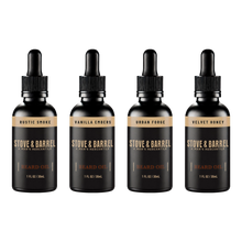 Four Stove & Barrel beard oil bottles in Rustic Smoke, Vanilla Embers, Urban Forge, and Velvet Honey scents