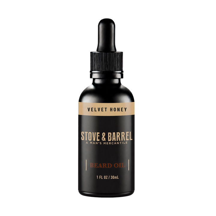Velvet Honey beard oil in sleek black bottle with dropper, nourishing men's grooming essential