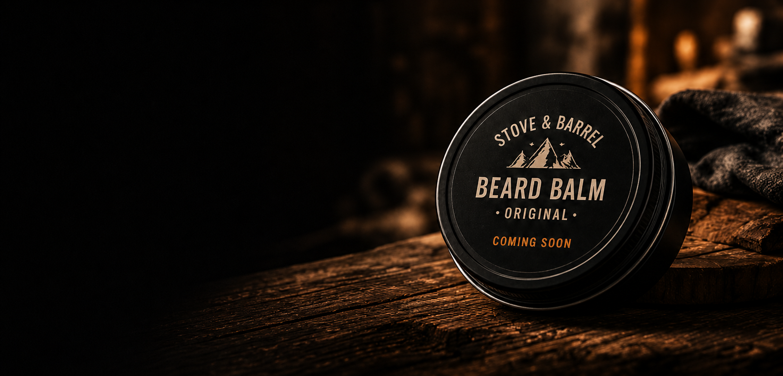 Stove & Barrel Original Beard Balm tin on rustic wood, coming soon